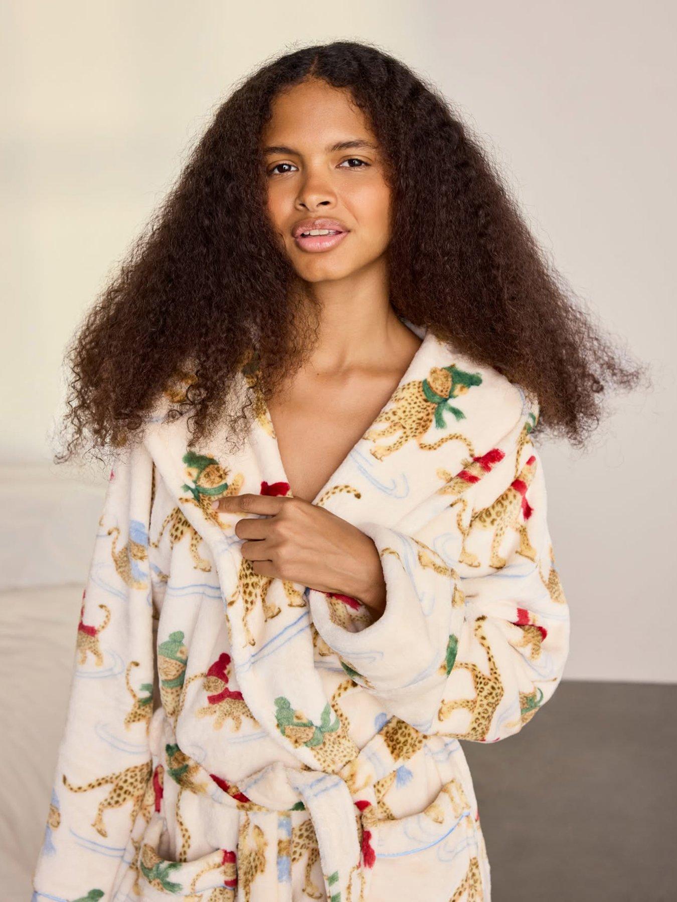 Image 5 of 6 of CHELSEA PEERS Fleece Ice Skating Leopards Print Hooded Dressing Gown - Off White