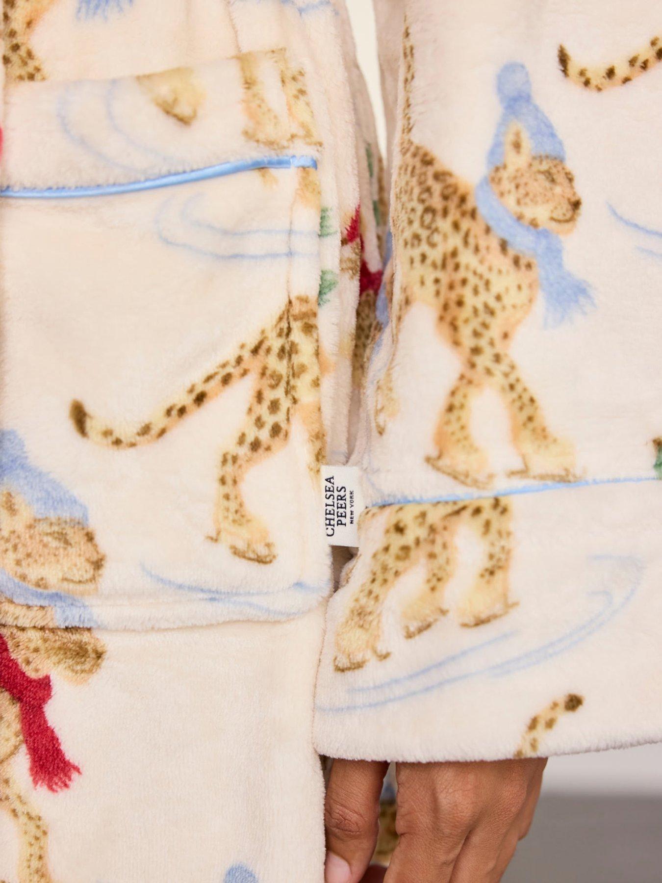 Image 6 of 6 of CHELSEA PEERS Fleece Ice Skating Leopards Print Hooded Dressing Gown - Off White