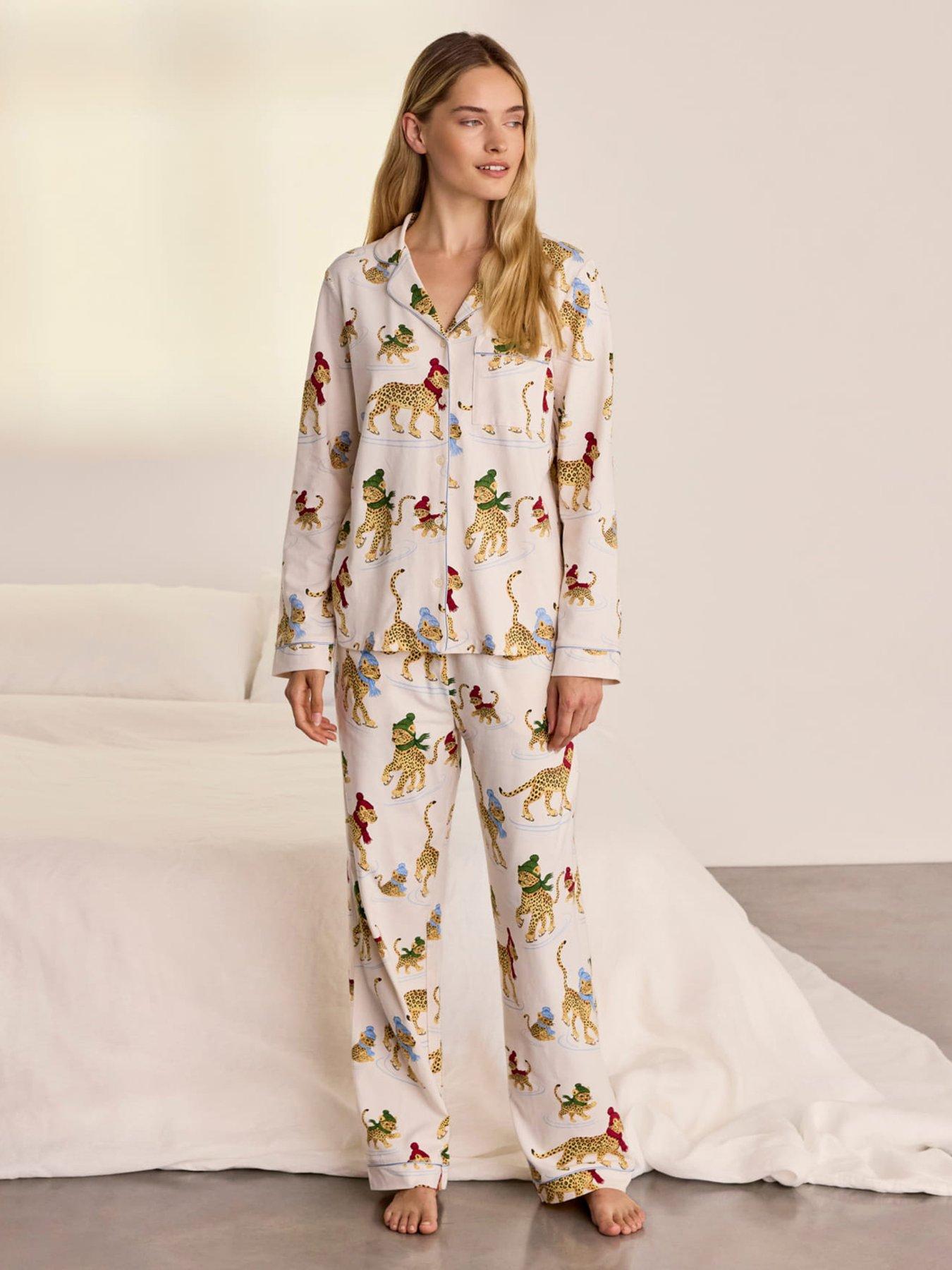 Image 1 of 6 of CHELSEA PEERS Womens Ice Skating Leopards Print Long Pyjama Set - White