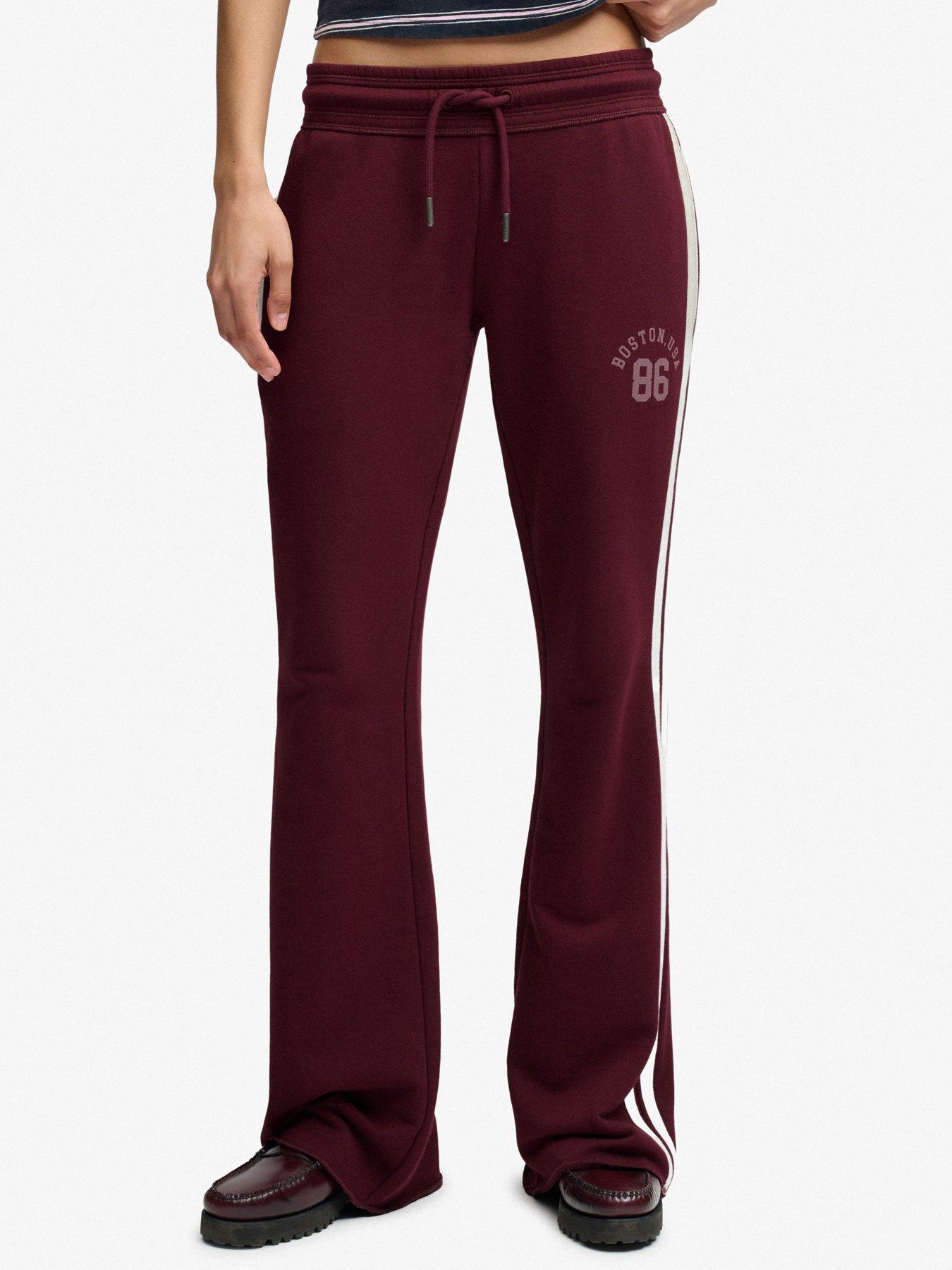 Image 1 of 6 of Superdry Superdry Ath Ess Stripe Flare Joggers - Red
