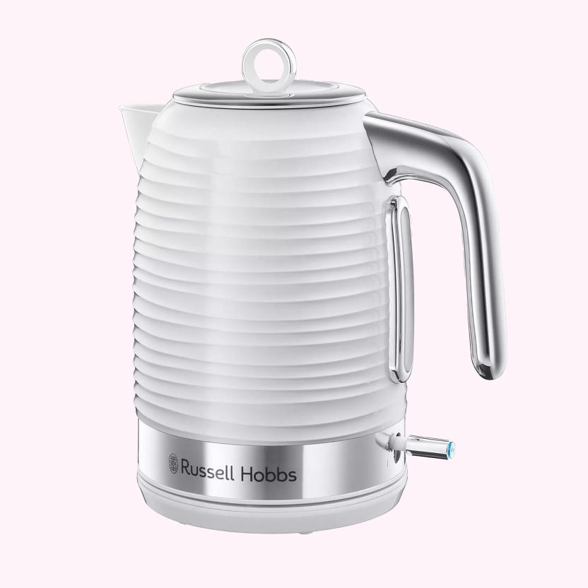 Close-up of the Russell Hobbs Inspired kettle in white and silver with a textured detail.