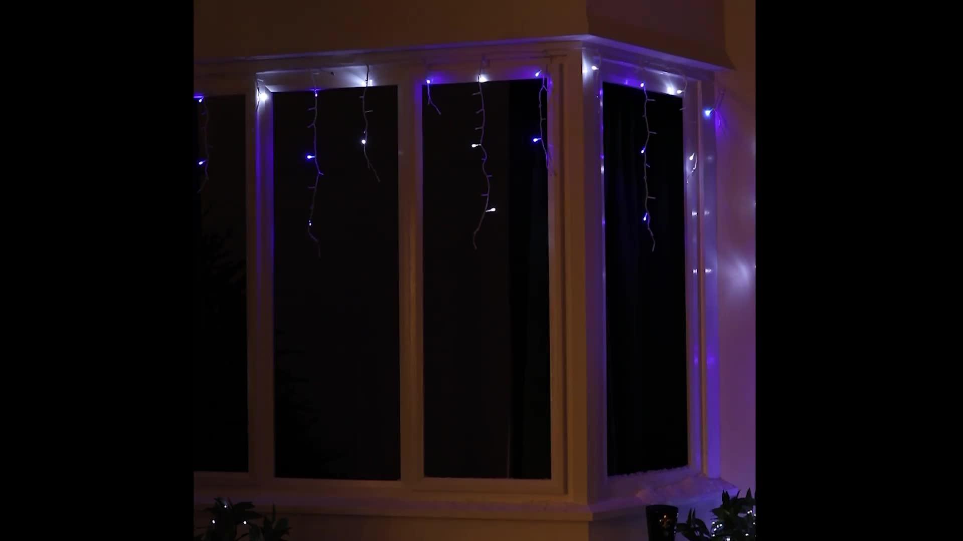 Image thumbnail 6 of 6 of Festive 960 Blue/White LED&nbsp;Snowing Icicle Outdoor Christmas Lights
