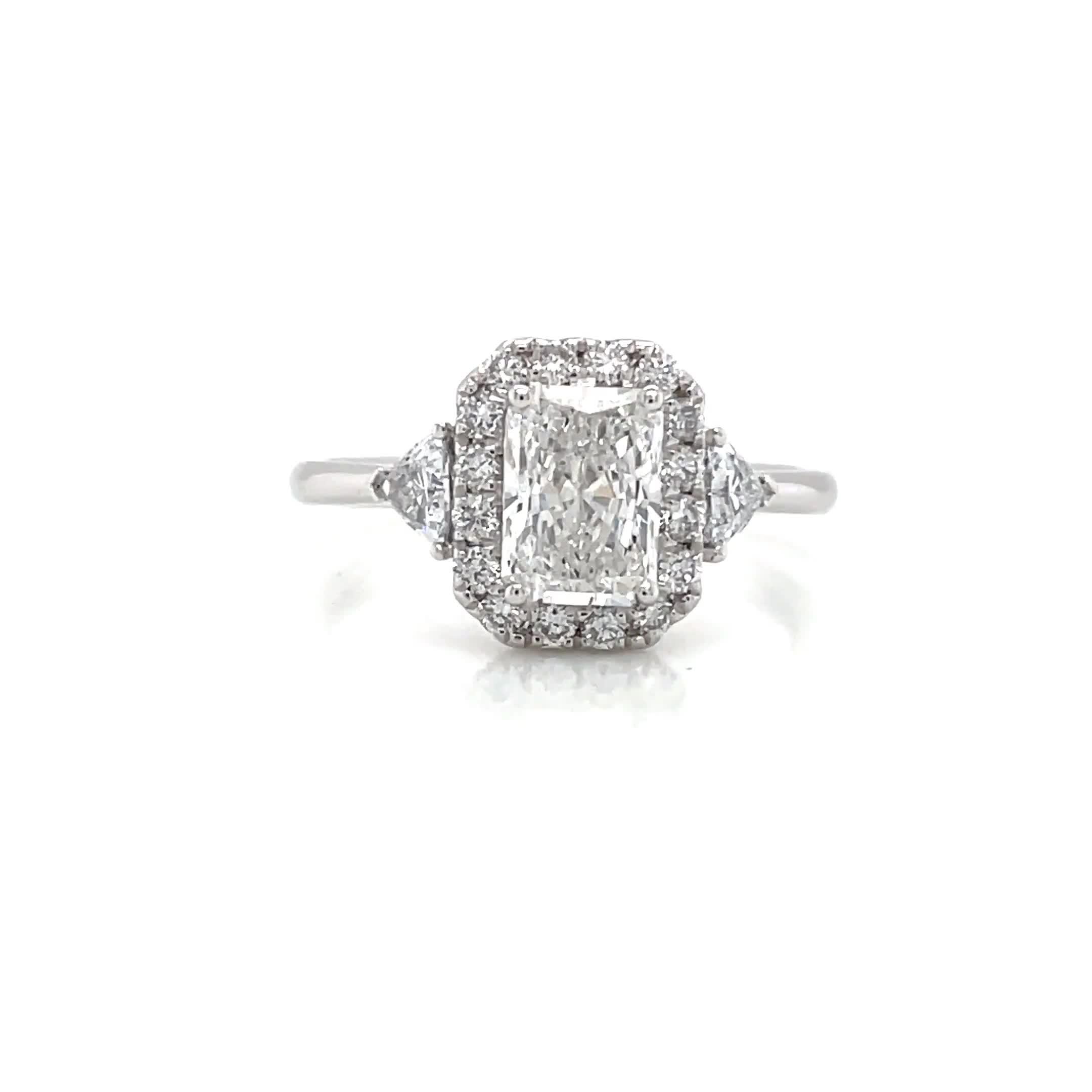 Image thumbnail 6 of 6 of Harriet Platinum Radiant Halo Trilogy Trillion Set Shoulders Lab Grown Diamond Ring