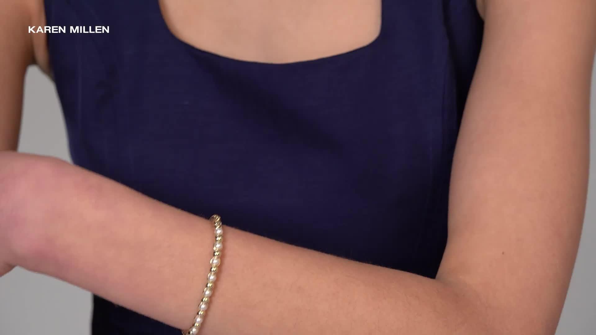 Image thumbnail 6 of 6 of Karen Millen Logo Pearl Hinged Bangle